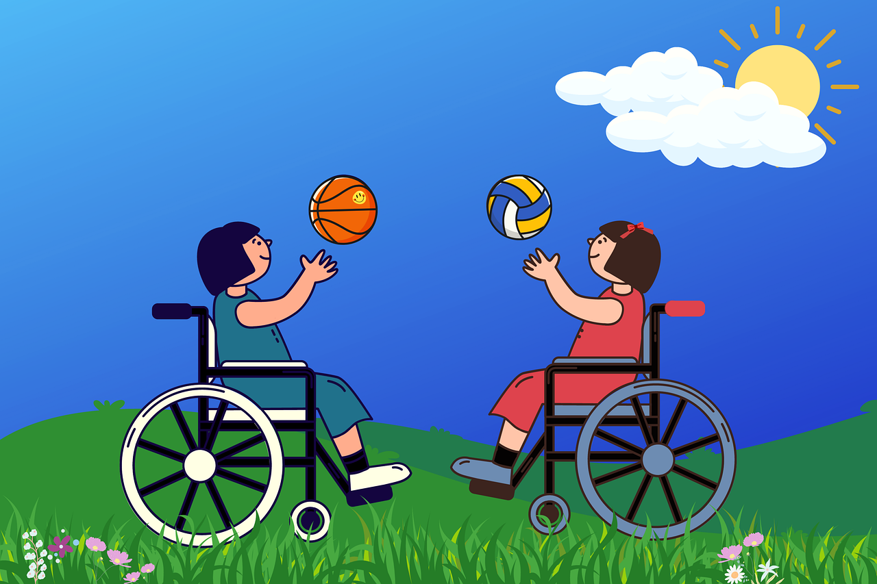 Little girls playing in wheelchairs with a ball
